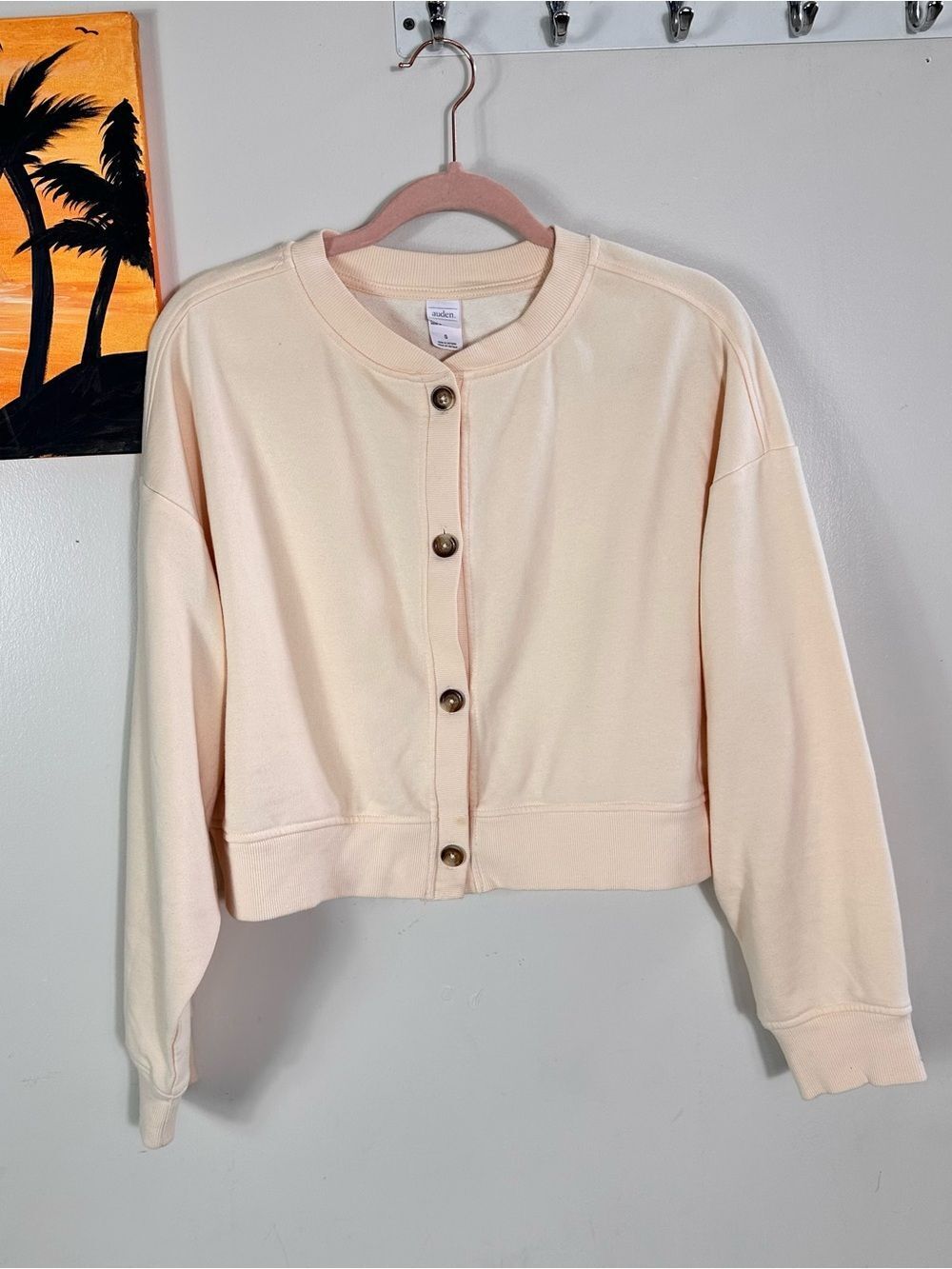 Auden Cropped Button-Up Sweatshirt in Light Peach